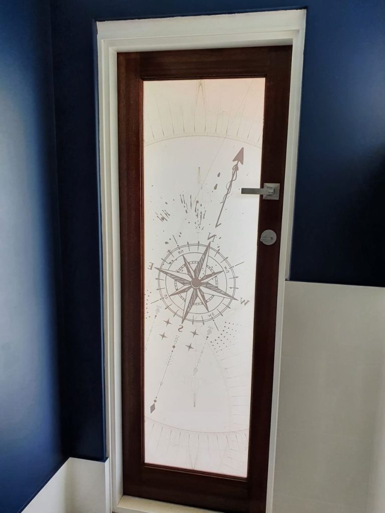 Nautical themed frosted glass door design